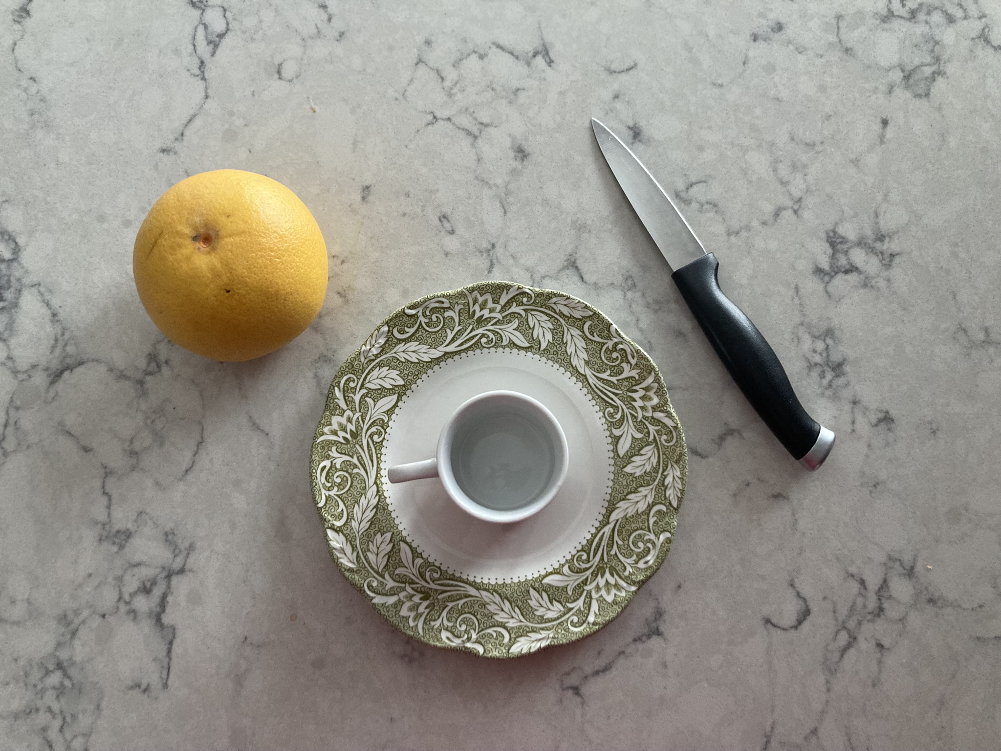 the knife, plate with the raised lip, & the little cup